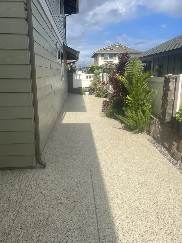 Exterior walkway next to home with epoxy flake coating