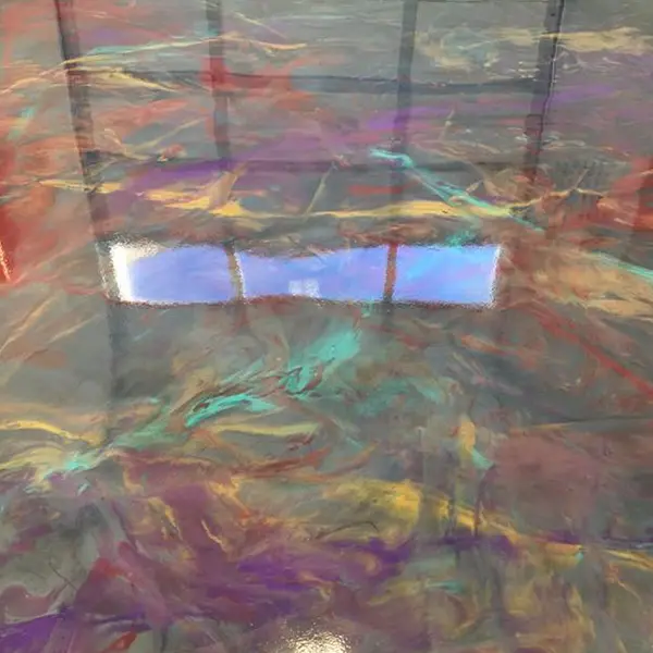 Decorative metallic reflector concrete coating