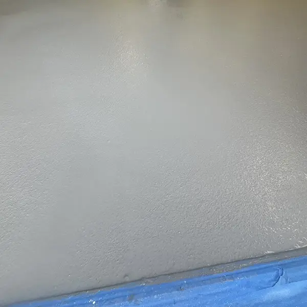 Close up of epoxy concrete coating on residential garage