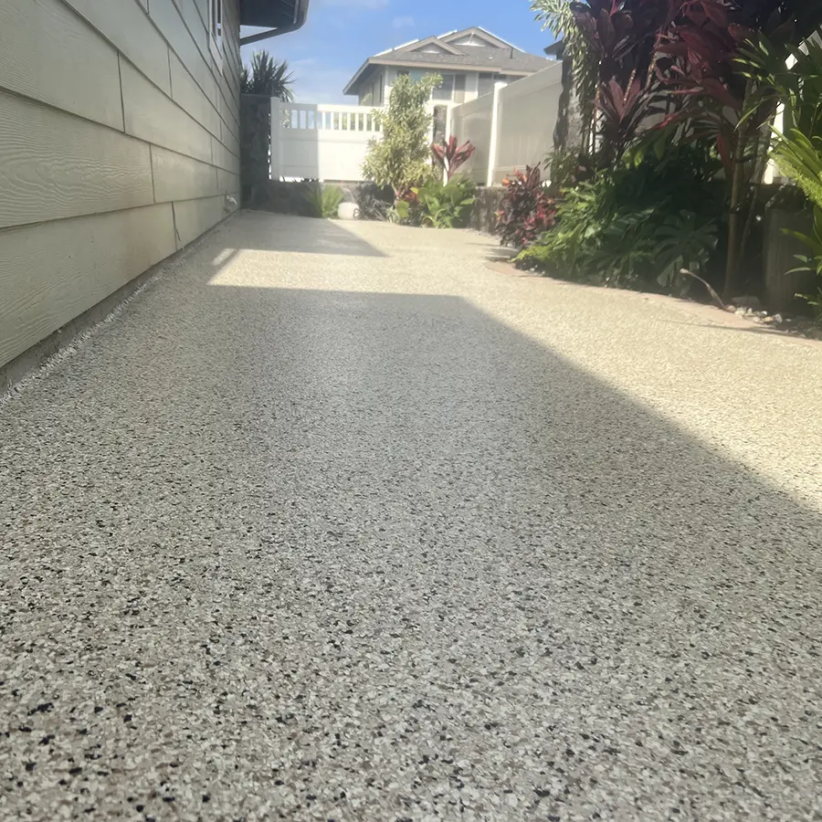 Exterior walkway next to home with epoxy flake coating