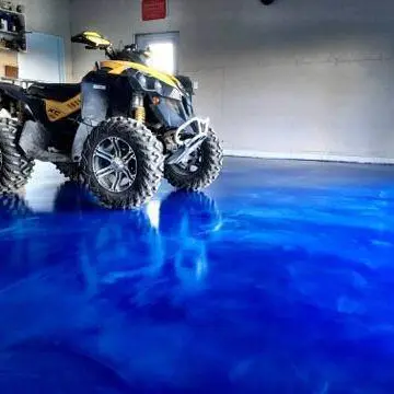 ATV in garage with blue reflector floor coating