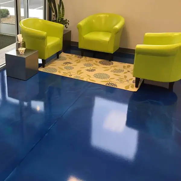 glossy dark blue epoxy floor coating in waiting room of professional office
