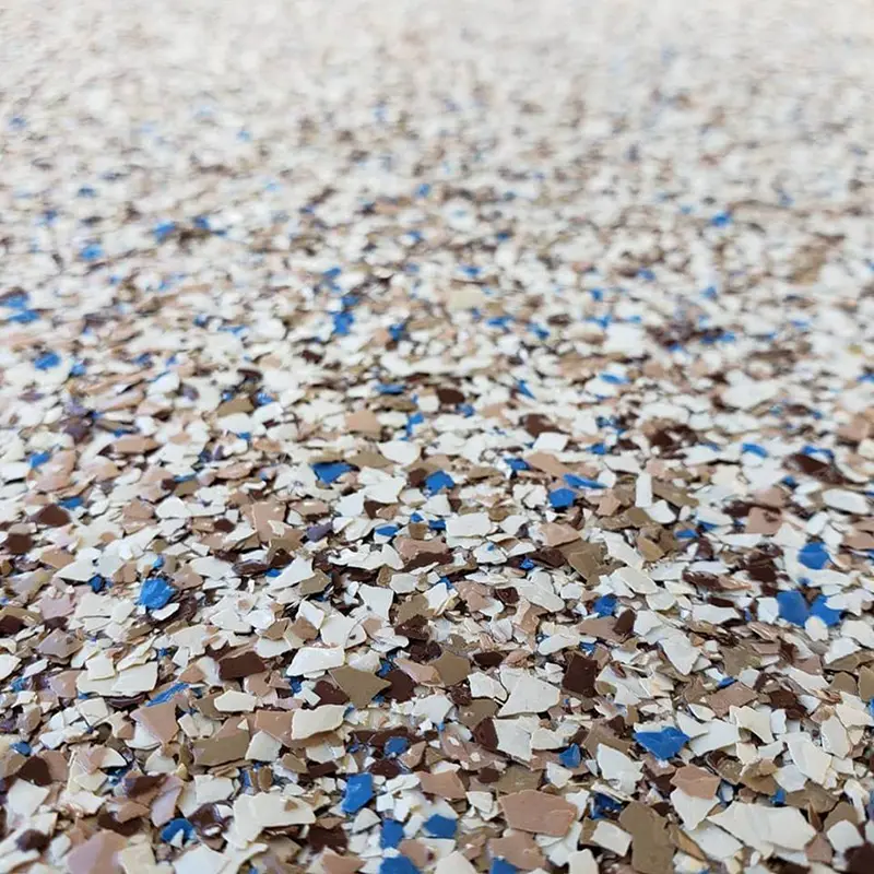 Close up of blue grey white and black flake floor