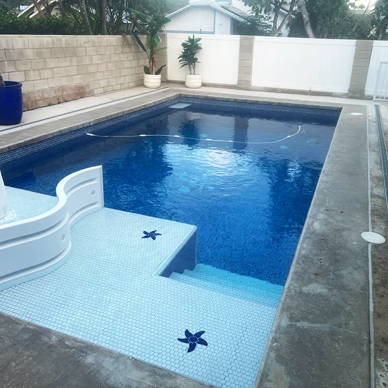 Hawaii backyard pool before concrete coating